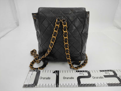 CHANEL Matelasse Lambskin Chain Backpack in Black with Gold Hardware