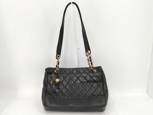 CHANEL Lambskin Matelasse Shoulder Bag with Ball Charm and Chain, Black, G Hardware