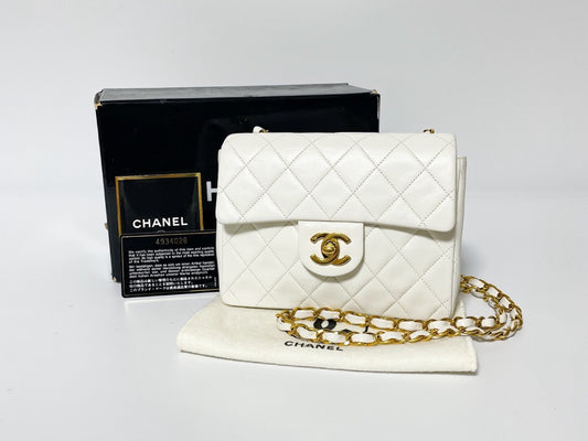 CHANEL Mini Matelasse White Lambskin Shoulder Bag with Seal