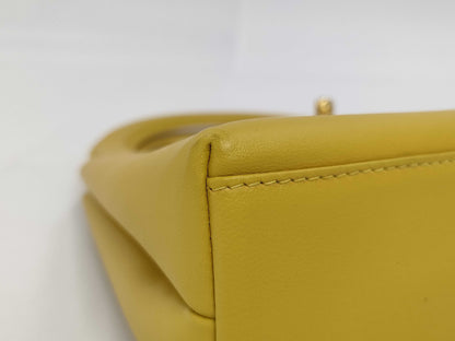 CHANEL Top Handle Lambskin Handbag with Turn Lock, Yellow