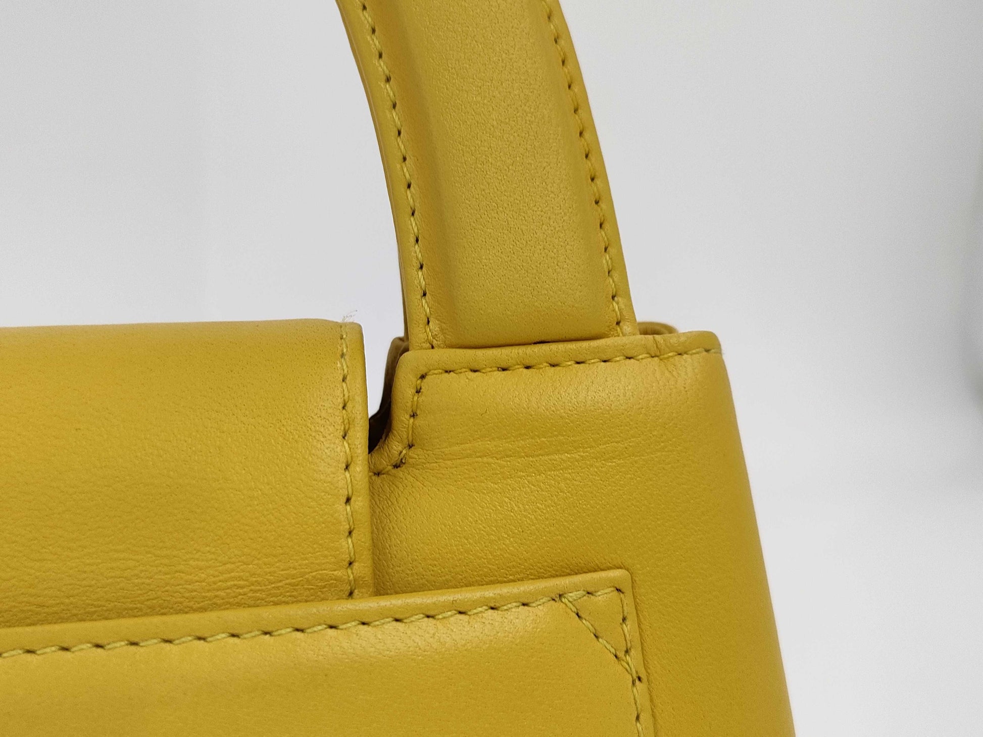 CHANEL Top Handle Lambskin Handbag with Turn Lock, Yellow