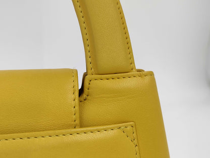CHANEL Top Handle Lambskin Handbag with Turn Lock, Yellow