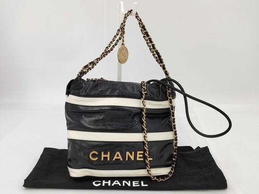 CHANEL CHANEL 22 Shiny Calfskin Chain Shoulder Bag AS3980 with Gold Hardware and Serial Number Plate in Black