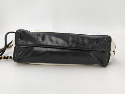 CHANEL CHANEL 22 Shiny Calfskin Chain Shoulder Bag AS3980 with Gold Hardware and Serial Number Plate in Black