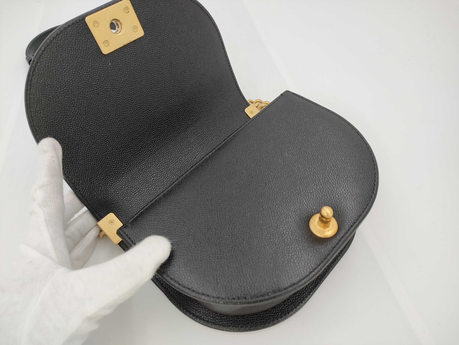 CHANEL Boy Chanel Round Caviar Leather Shoulder Bag with Gold Hardware and Chain Serial Number Plate in Black