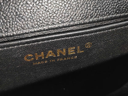 CHANEL Boy Chanel Round Caviar Leather Shoulder Bag with Gold Hardware and Chain Serial Number Plate in Black
