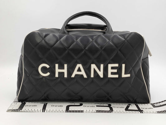 CHANEL Matelasse Lambskin Boston Bag with Seal, No. 3 Boston Bag