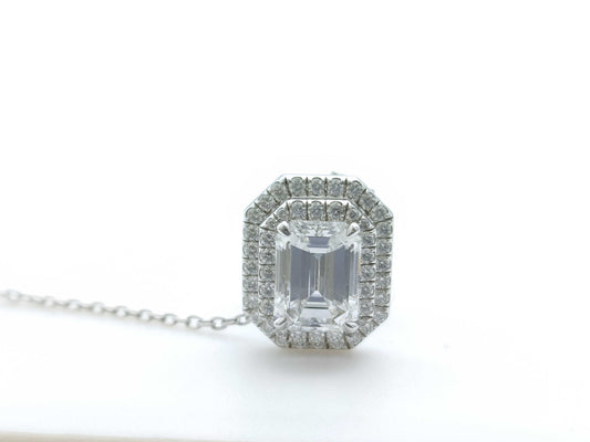 HARRY WINSTON Harry Winston PT950 Pin Brooch with 1.54ct Emerald Cut Diamond, D/VS1, and 3.6g Pavé Diamonds.
