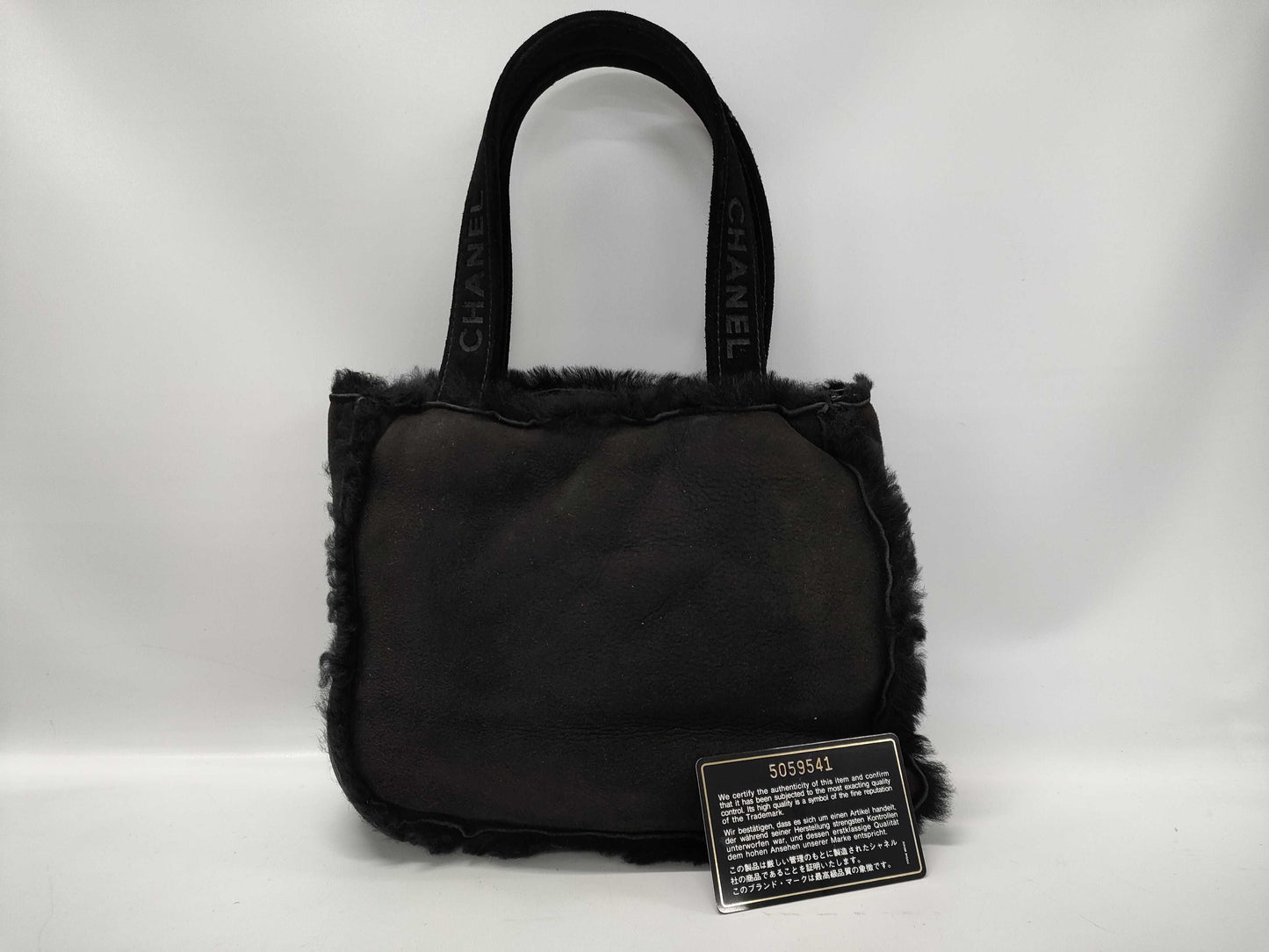 CHANEL Mouton Fur Handbag Black