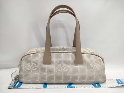 CHANEL New Travel Line Nylon and Leather Handbag in Pink Beige with Silver Hardware
