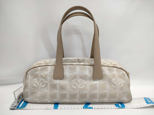 CHANEL New Travel Line Nylon and Leather Handbag in Pink Beige with Silver Hardware