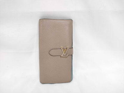 LOUIS VUITTON Taurillon LV Vertical Wallet