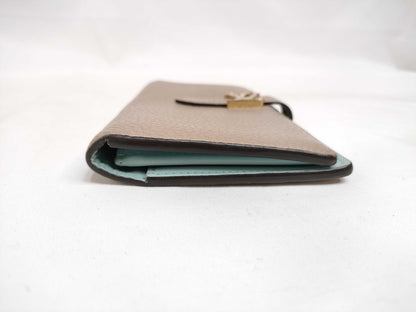 LOUIS VUITTON Taurillon LV Vertical Wallet