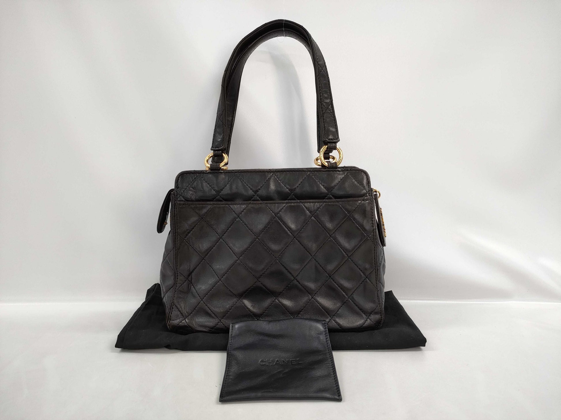 CHANEL Matelasse Lambskin Handbag in Black with Gold Hardware