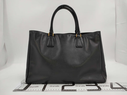 PRADA Saffiano Galleria 2-Way Handbag in Black with GD Hardware and Shoulder Strap with Clochet
