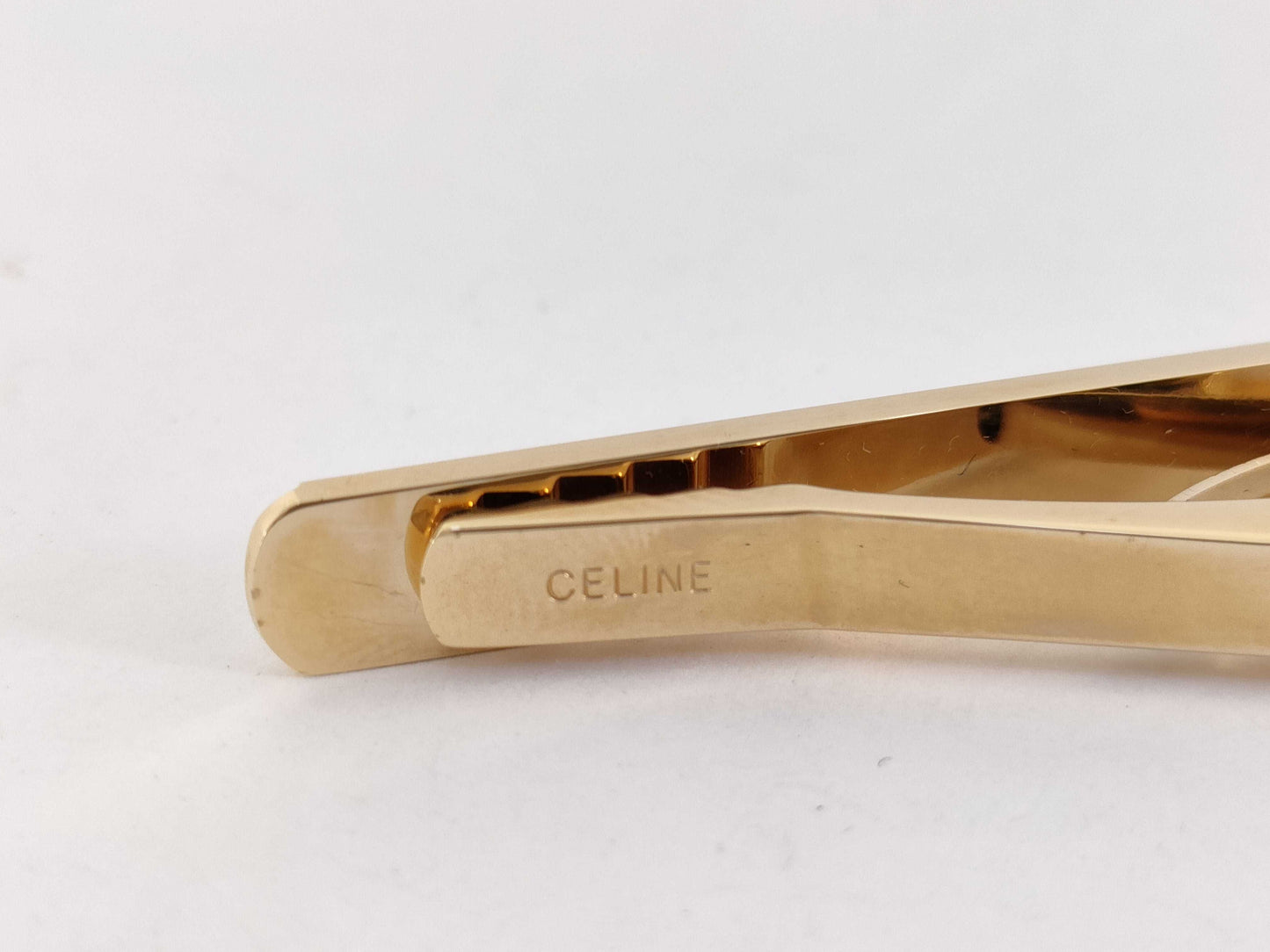 CELINE brand tie pins and cufflinks