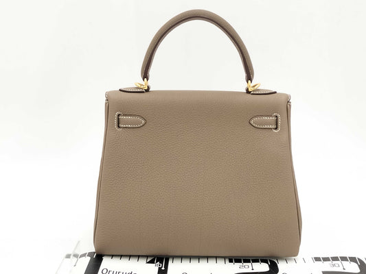 HERMES Kelly 25 Togo Etoupe Handbag with Gold Hardware and GP K Stamp