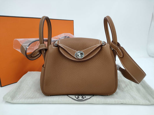 HERMES Lindy Mini Shoulder Bag in Taurillon Gold with Silver Hardware and K Stamp, with Protective Seal