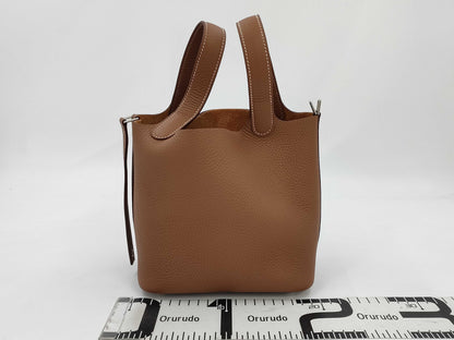 HERMES Picotin Lock PM Handbag in Gold, Taurillon Clemence Leather, Silver Hardware, K Stamp