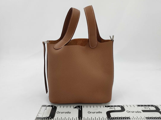 HERMES Picotin Lock PM Handbag in Gold, Taurillon Clemence Leather, Silver Hardware, K Stamp
