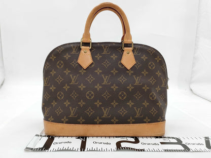 LOUIS VUITTON Monogram Alma Handbag