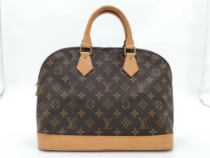 LOUIS VUITTON Monogram Alma Handbag