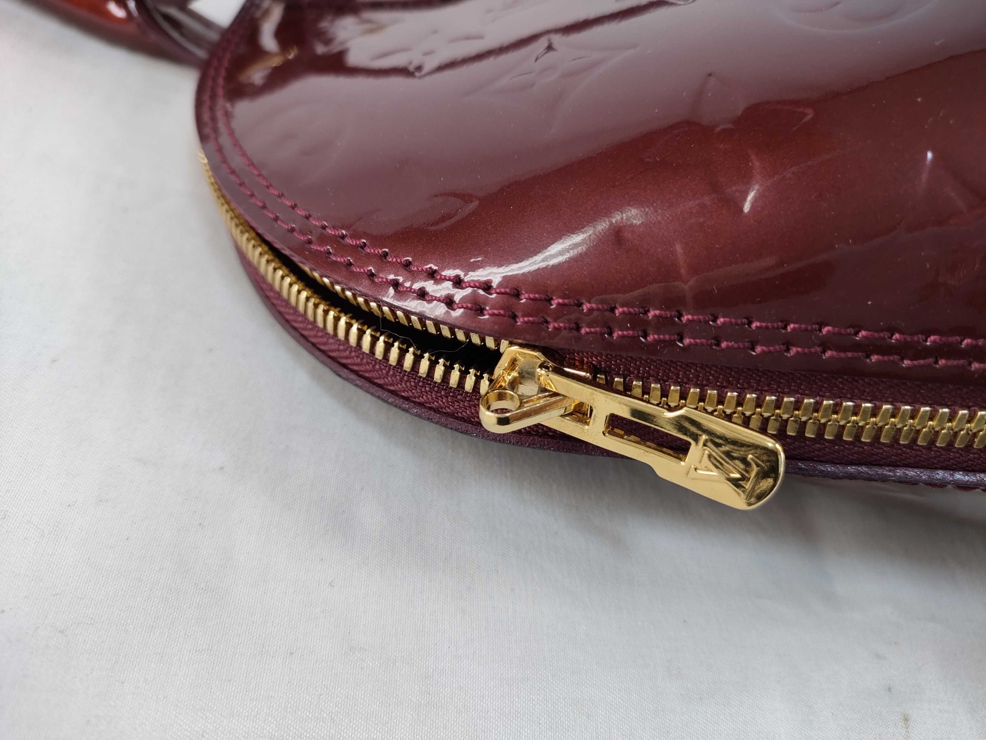 LOUIS VUITTON Louis Vuitton Enamel Alma BB Handbag