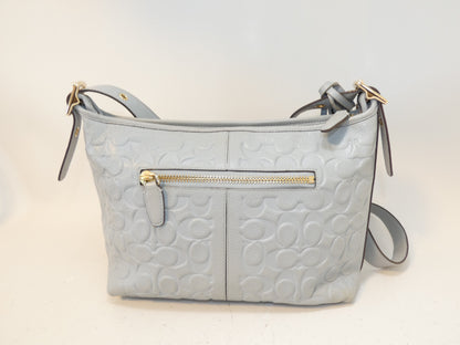 COACH Signature Embossed Leather Tassel Shoulder Bag