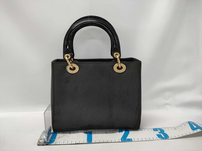 Dior Lady Dior Suede Black Handbag with dust bag and shoulder strap.
