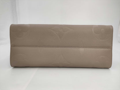 LOUIS VUITTON On the Go MM Monogram Empreinte Tourterelle M45607 Tote Bag
