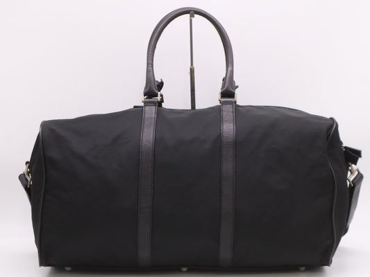 PRADA Nylon Triangle Logo Boston Bag in Black. Includes dust bag, name tag, crochet, padlock, and two keys.