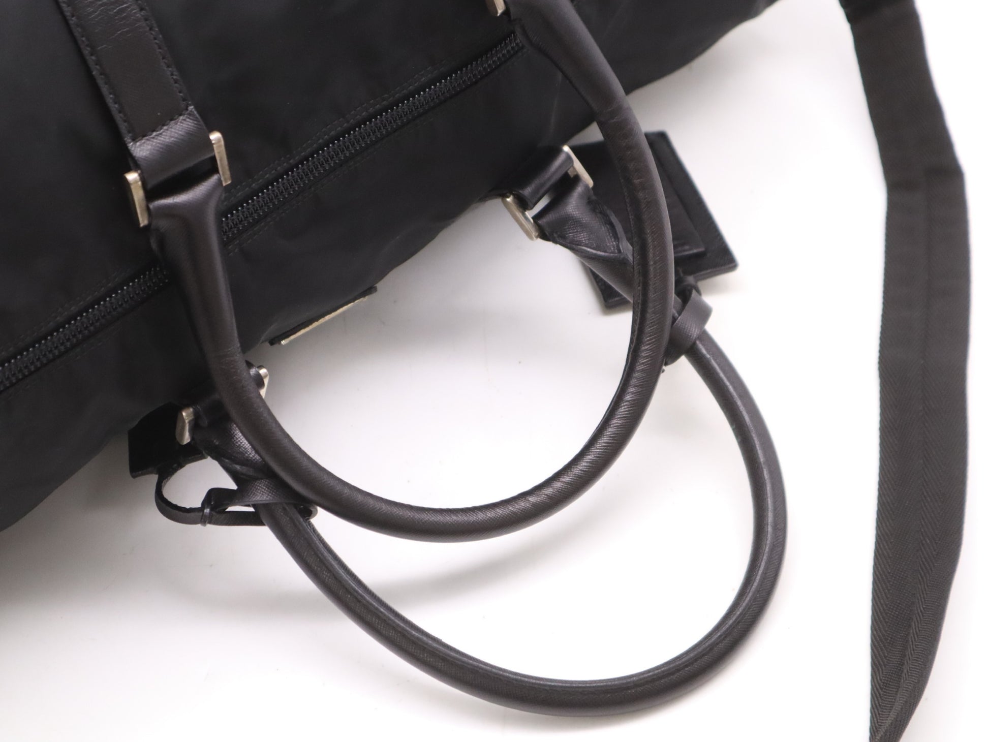 PRADA Nylon Triangle Logo Boston Bag in Black. Includes dust bag, name tag, crochet, padlock, and two keys.