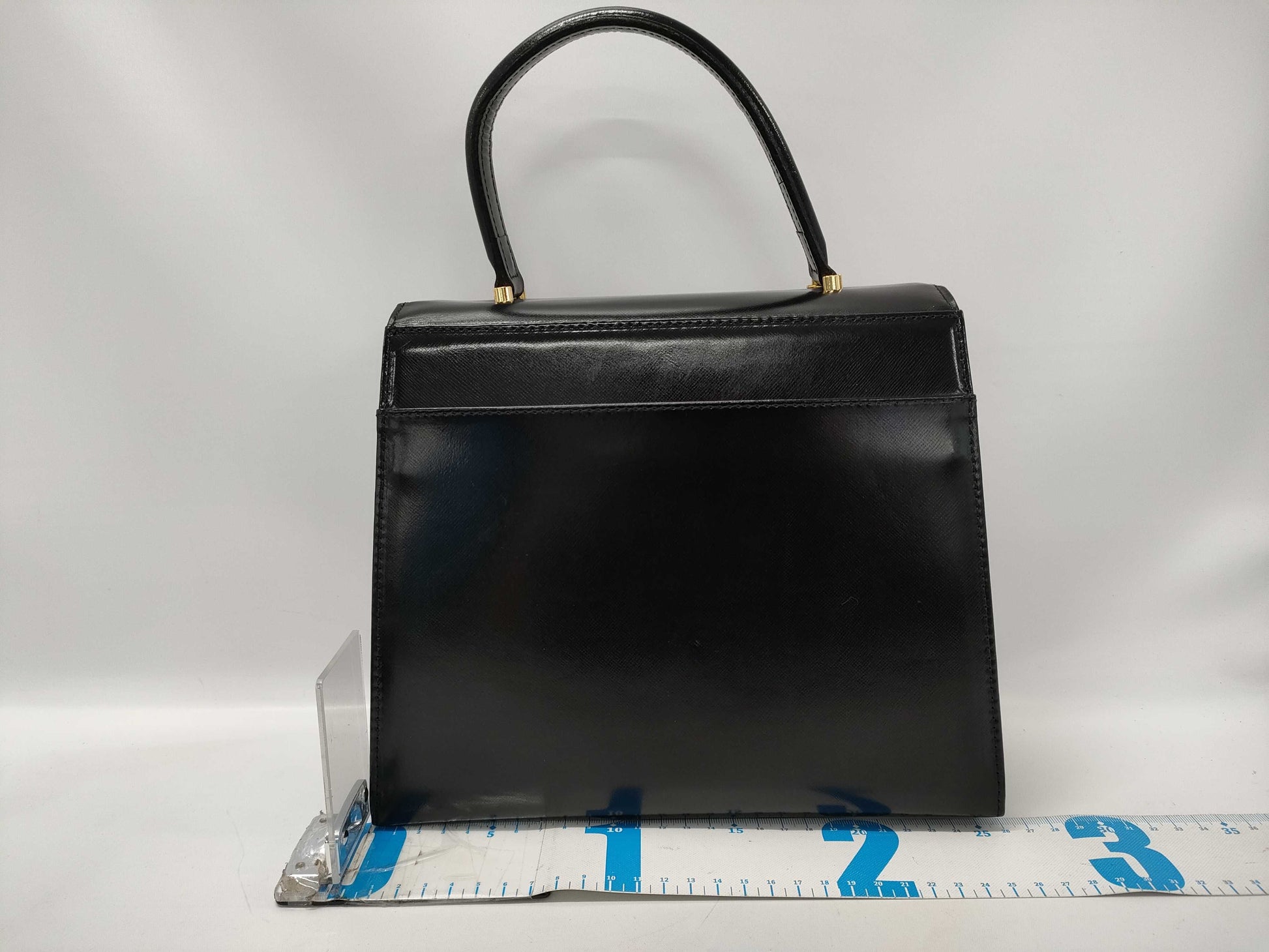 VERSACE Sunburst Leather Handbag in Black with Dust Bag