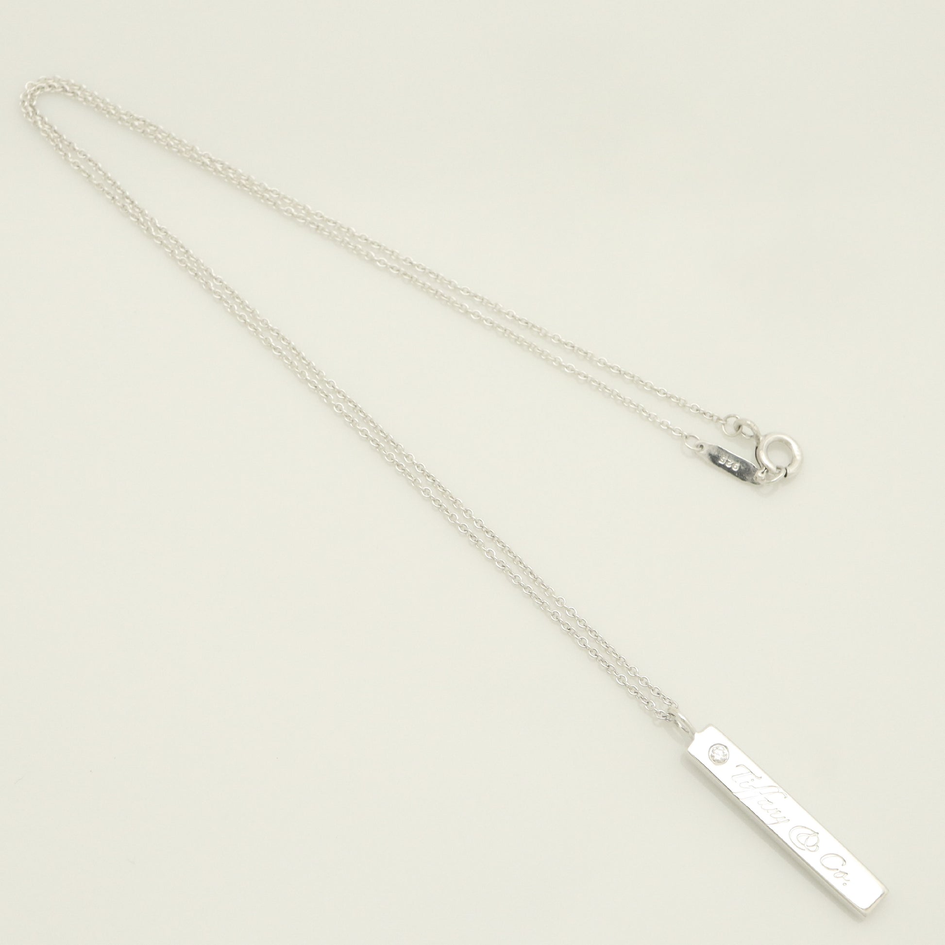Tiffany & Co. Notes Bar 1-Piece Diamond Necklace Pendant in Sterling Silver - Weight: 3.25g
