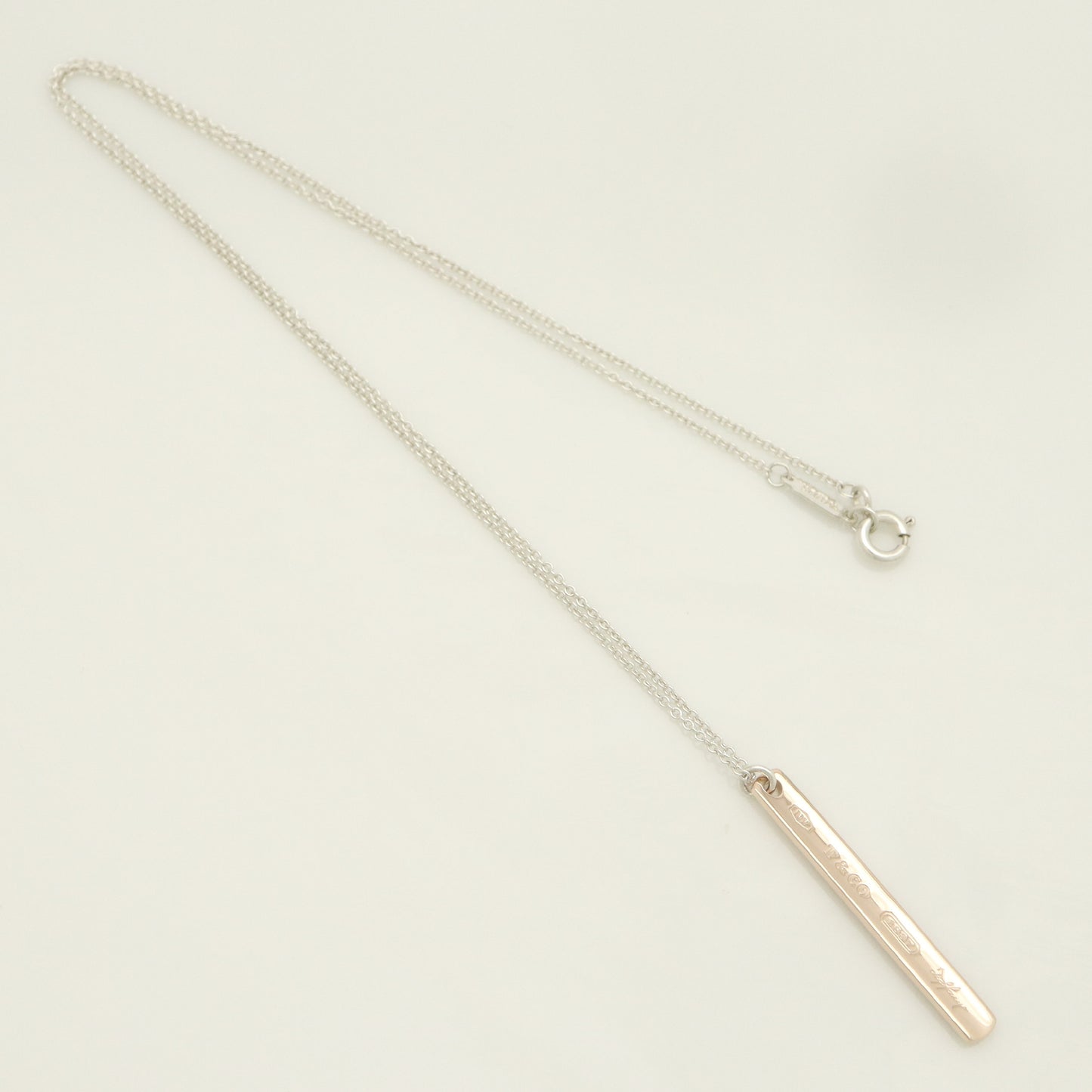 Tiffany & Co. 1837 Narrow Bar Rubedo Metal Necklace Pendant in Sterling Silver , Weight: 2.50g