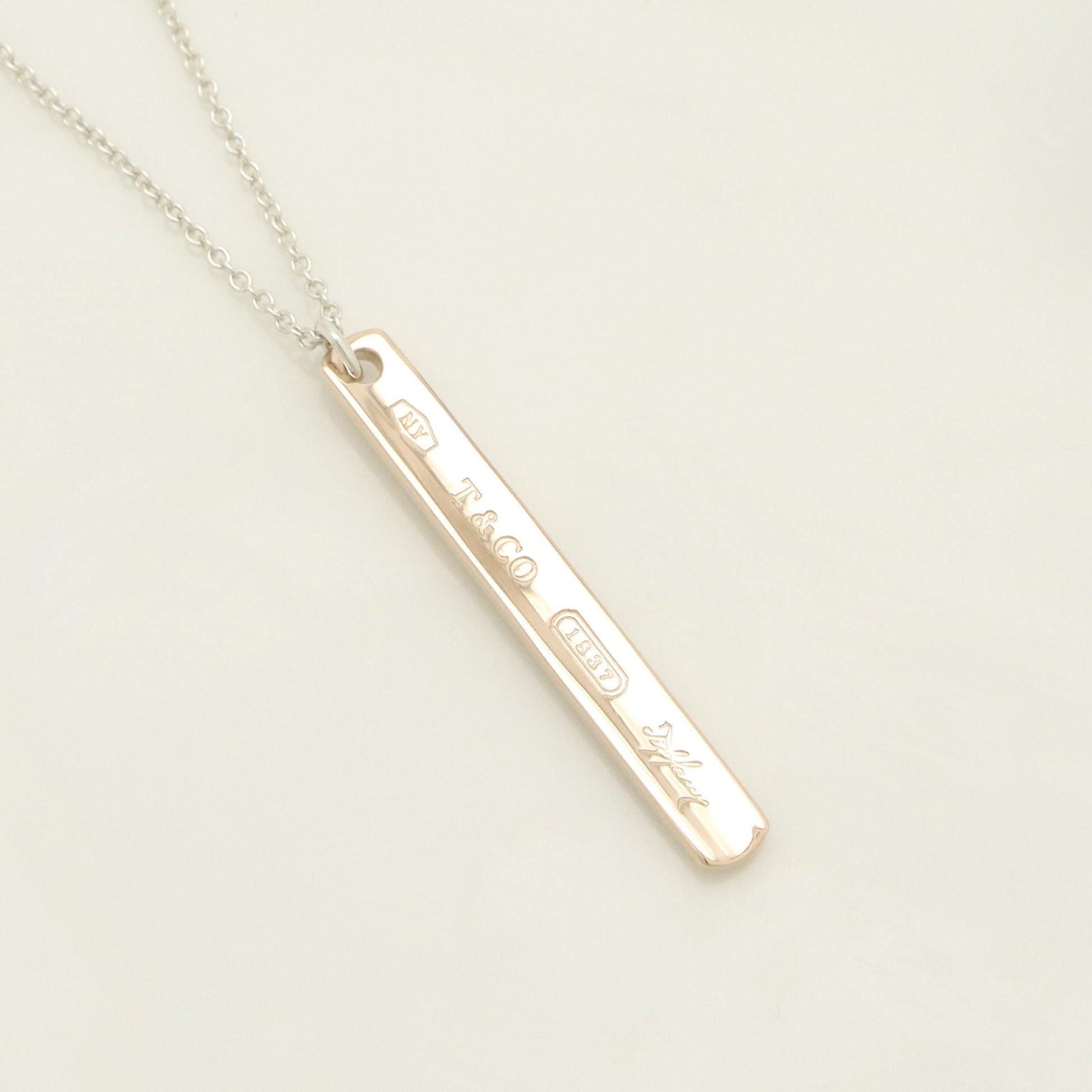 Tiffany & Co. 1837 Narrow Bar Rubedo Metal Necklace Pendant in Sterling Silver , Weight: 2.50g