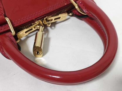 LOUIS VUITTON Vernis Alma BB Handbag