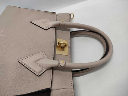 LOUIS VUITTON Louis Vuitton On My Side Handbag Handbag