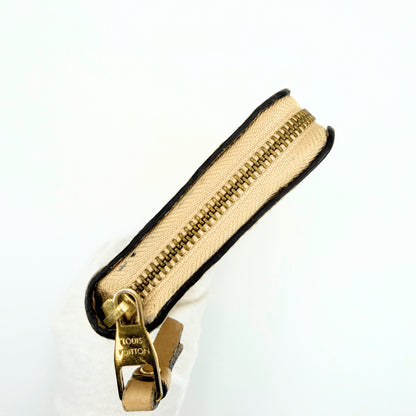 LOUIS VUITTON Monogram Empreinte Zippy Wallet, Beige, M61866.