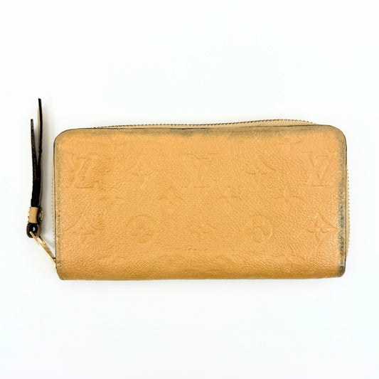LOUIS VUITTON Monogram Empreinte Zippy Wallet, Beige, M61866.