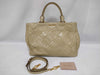 Miu Miu Miu 2-way handbag/shoulder bag in beige quilted leather.
