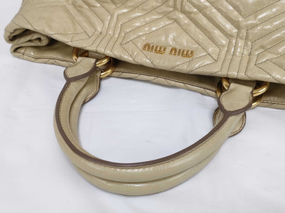 Miu Miu Miu 2-way handbag/shoulder bag in beige quilted leather.