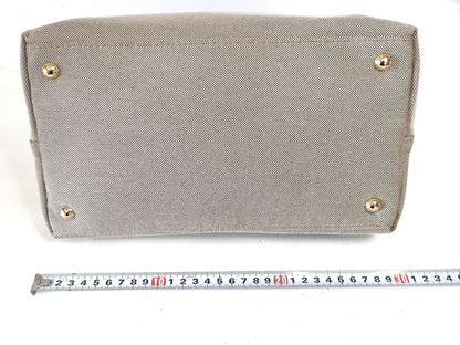 PRADA Blue Leather Canvas Jacquard Handbag with Gold Hardware