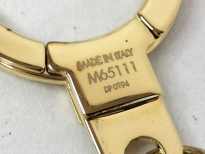 LOUIS VUITTON LOUIS VUITTON Louis Vuitton Gold Bag Charm M65111 Key Ring LV Initial Key Case Key Holder