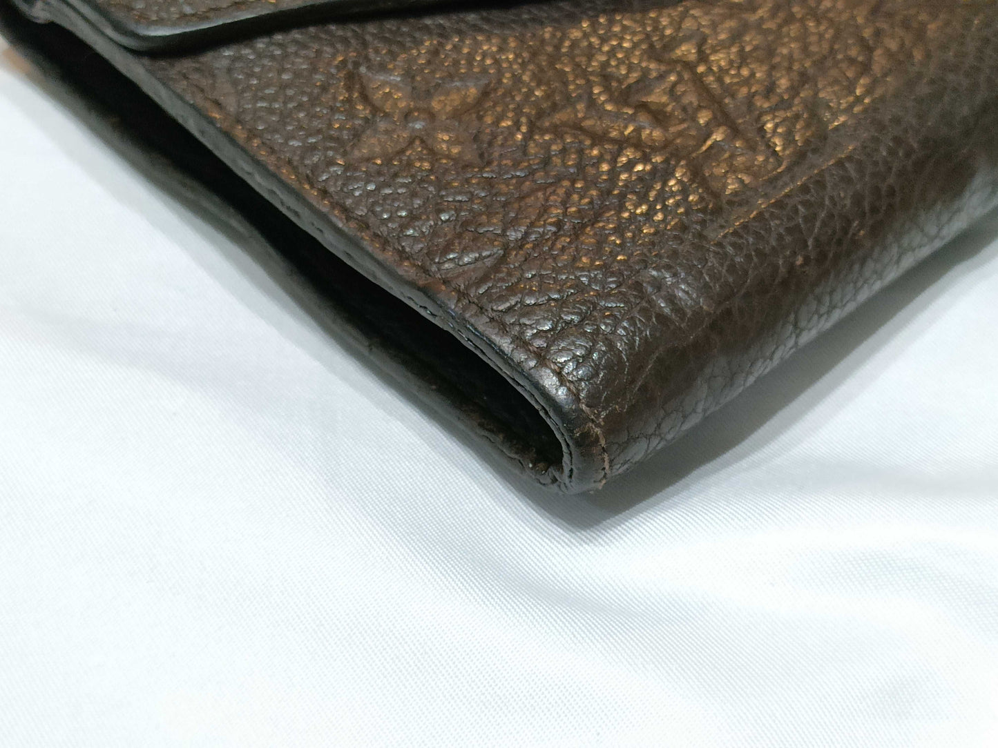 LOUIS VUITTON Monogram Empreinte Curie's Compact Brown Folding Wallet M60543