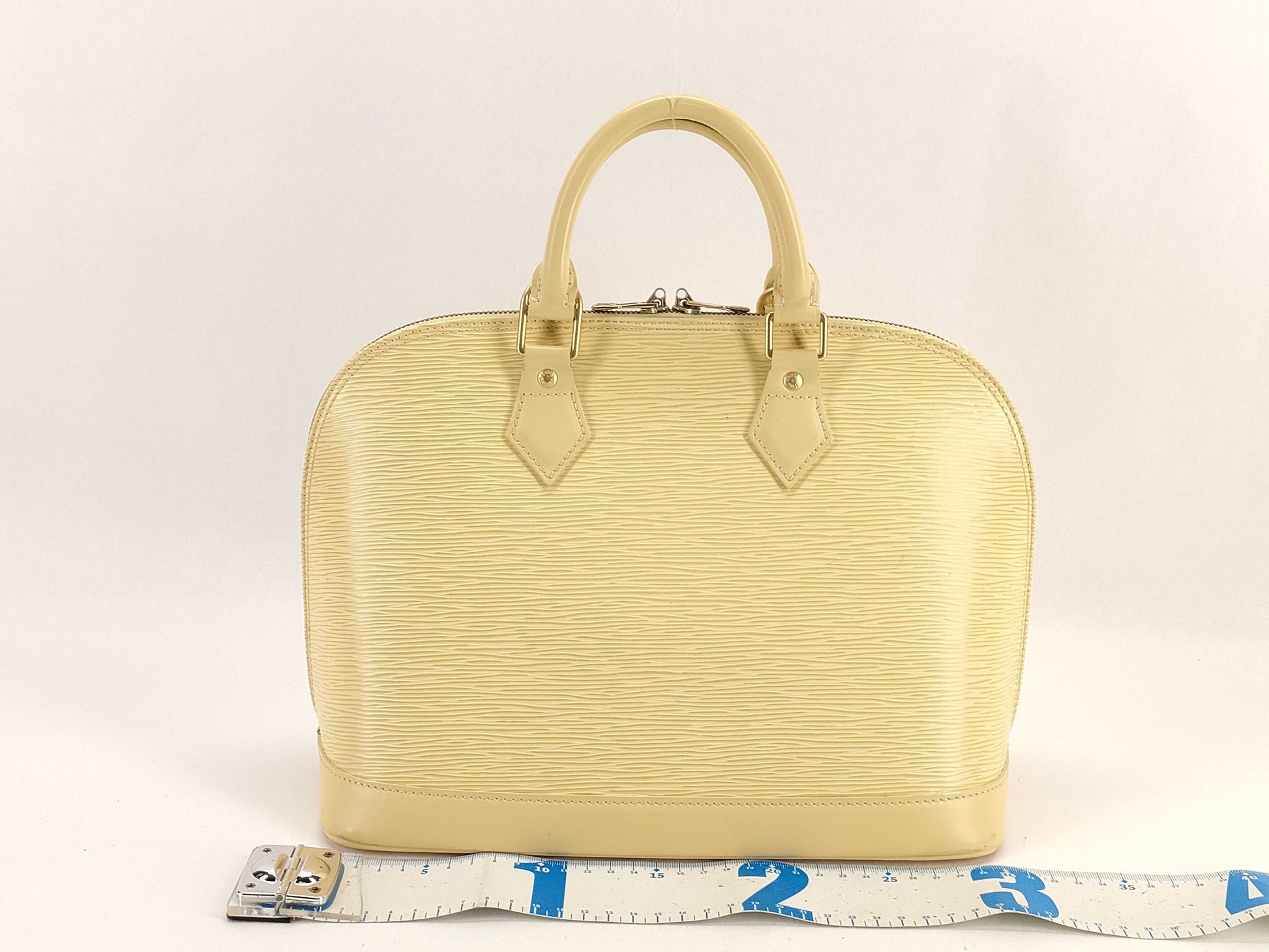 LOUIS VUITTON Epi Alma Handbag in Light Yellow 