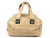 CHANEL Caviar Skin Handbag with Coco Mark and Silver Hardware, Beige