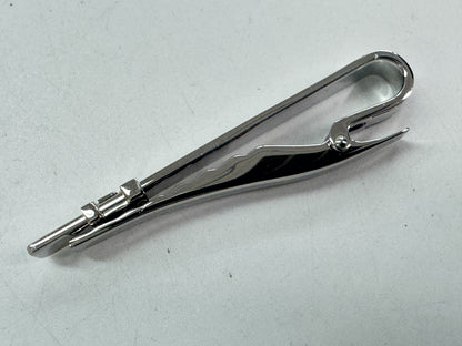 LOUIS VUITTON Monogram cufflinks and tie clip.