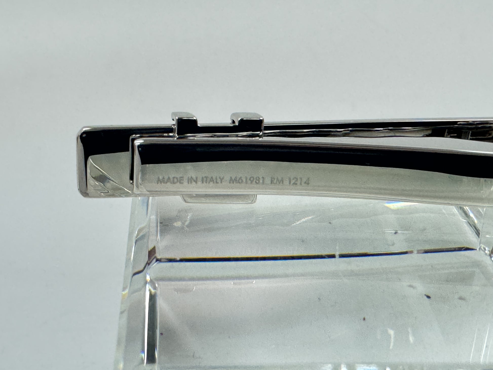 LOUIS VUITTON Monogram cufflinks and tie clip.