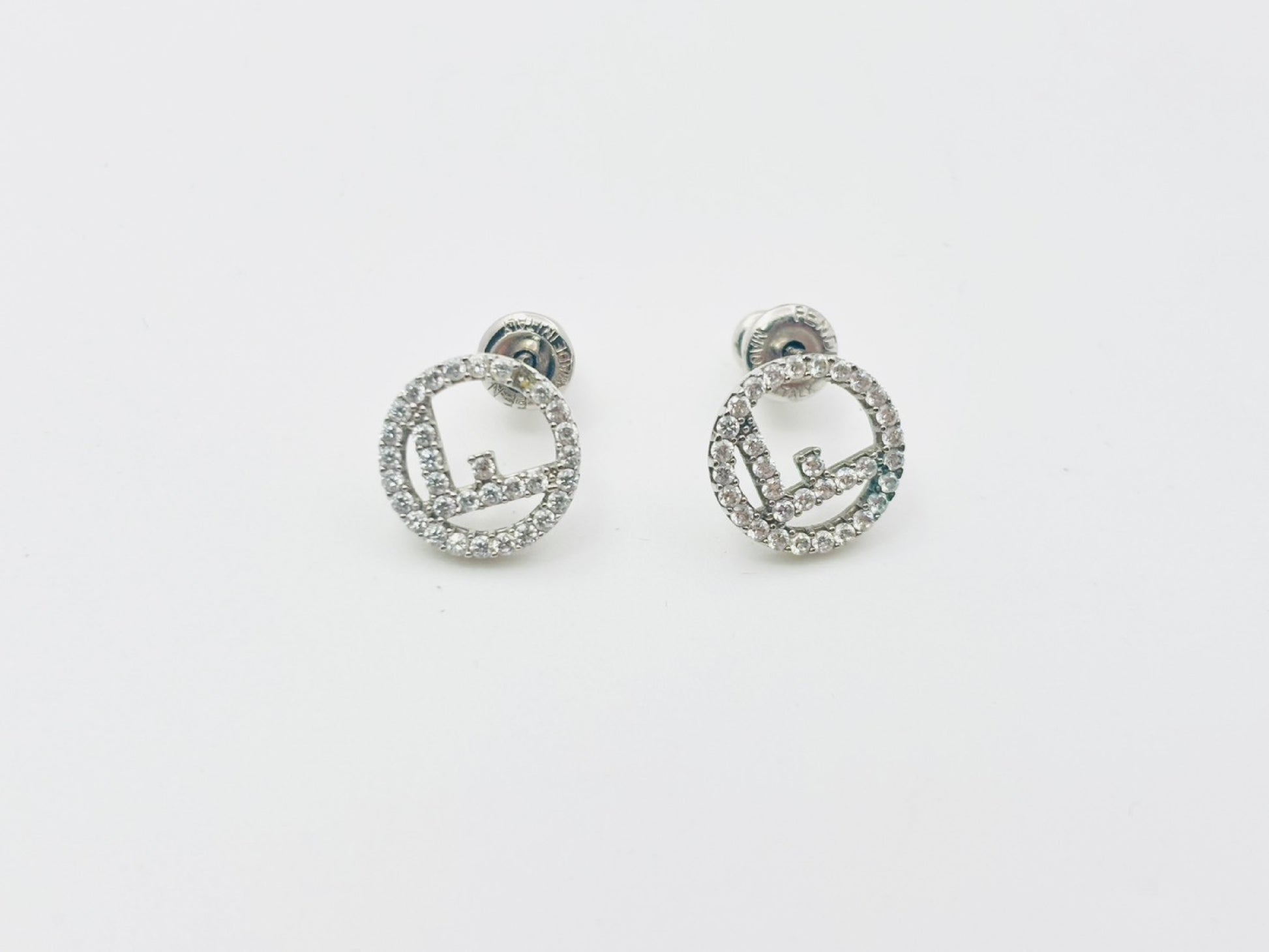 FENDI F is Fendi rhinestone earrings in silver